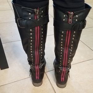 Black boots with belt and red zipper
